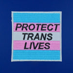 Protect trans lives iron on patch
