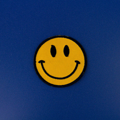 Yellow smiley face iron on patch
