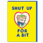 Card with a cartoon bear in a heart and text 'SHUT UP FOR A BIT' on a yellow background